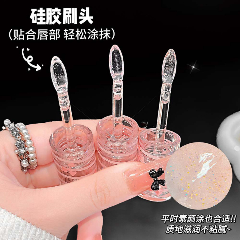 GreatAngel Ballet Ribbon Lip Oil con brillo fino, agua suave, maquillaje transfronterizo de labios de vidrio transparente