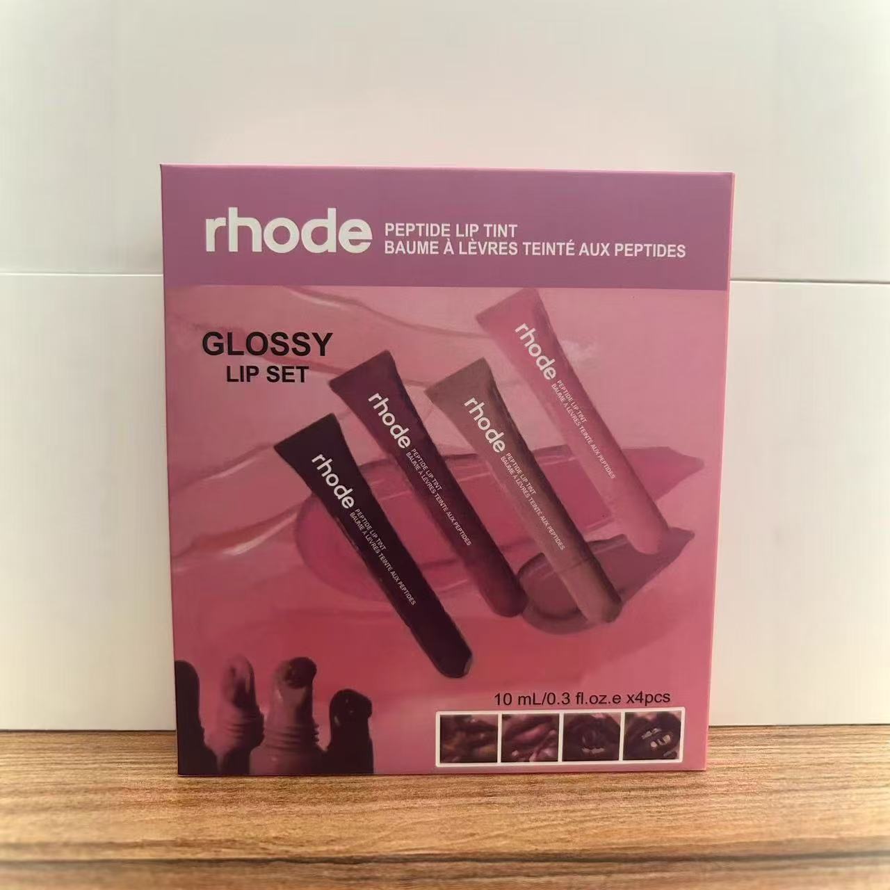 Rhode dodaq parıltısı və dodaq balzamı