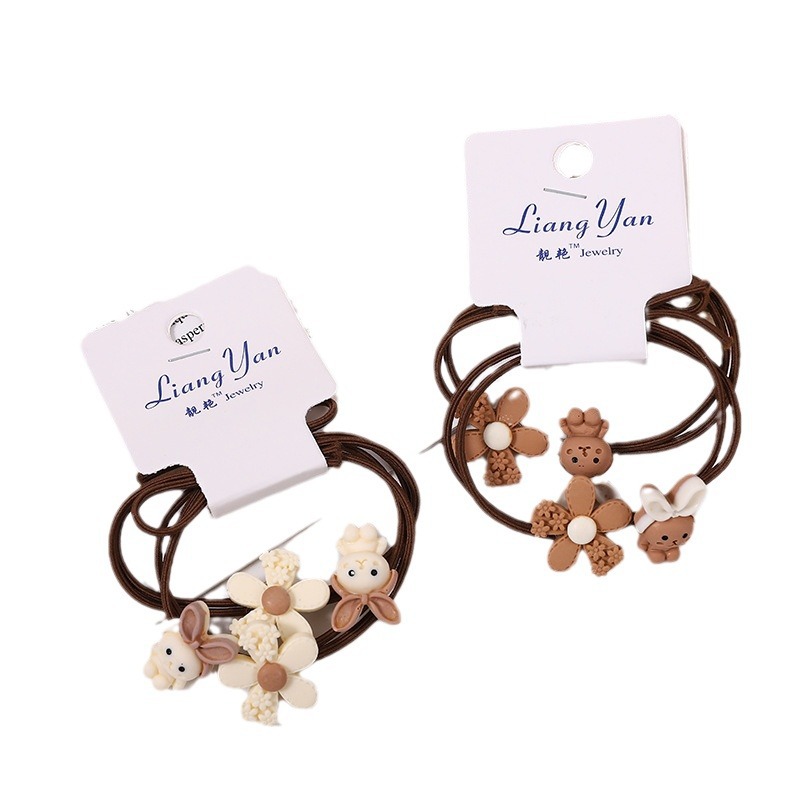 009 Ventas Directas Tarjeta de orden camuflaje A cuadros intestino grueso banda de pelo cuerda de pelo banda de goma tienda física dos yuanes tienda accesorios para el cabello accesorios para la cabeza