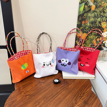 批发彩色卡通印花礼品帆布袋学生小手拎包零钱袋休闲手提妈咪包女