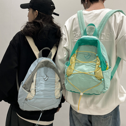 New Japanese niche color matching backpack for women 2024 new sports travel backpack middle and high school student school bag trend