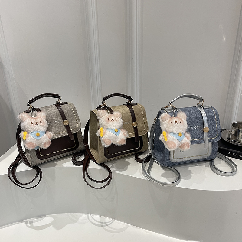 英伦复古双肩包女2025新款潮学生双肩背包多功能书包手提旅行包女