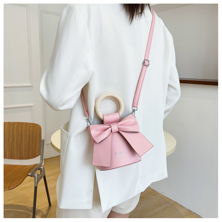 2022 Spring New Fashion Female Cylinder Retro Small Shoulder Crossbody Bowknot Bag display picture 4