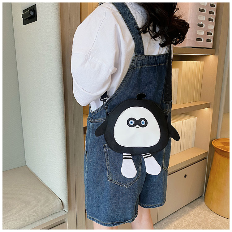 The new 2024 children's egg-shaped party backpack is a cute cartoon canvas single-shoulder bag and a fashionable and stylish small backpack undefined