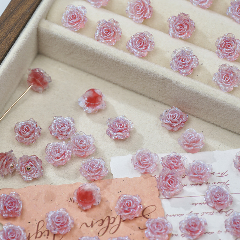 穴のない細いキラキラの柔らかいゴムの花の光はバラの花の片面の彫刻のdiyの手作りの数珠のネイルの携帯電話のケースの材料を変えます。