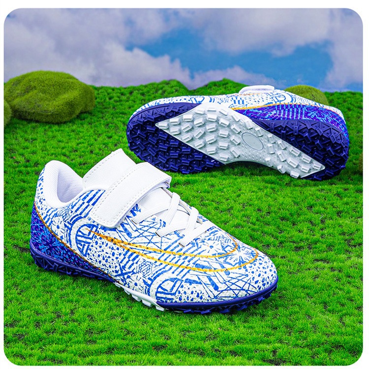 Zapatos de fútbol para niños con velcro bajo nuevo tipo de zapatos de entrenamiento transfronterizos de entrenamiento profesional de estudiantes de fútbol con clavos largos