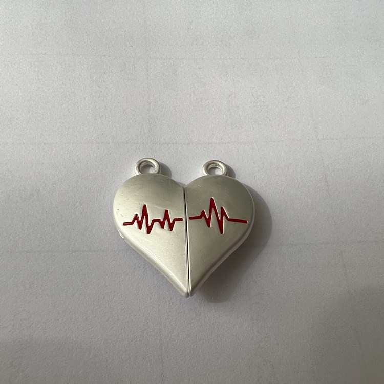 Nuevo amor transfronterizo ECG pareja collar simple nicho diseño imán colgante joyería original al por mayor