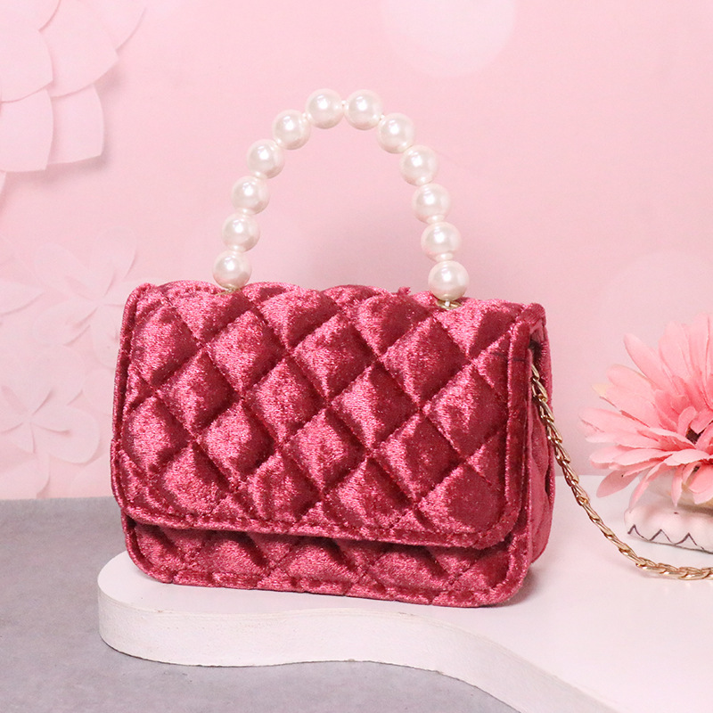2025 primavera y verano estilo caliente moda casual niños dulces bolsa de gelatina mini bolso de mensajero de un solo hombro variedad al por mayor