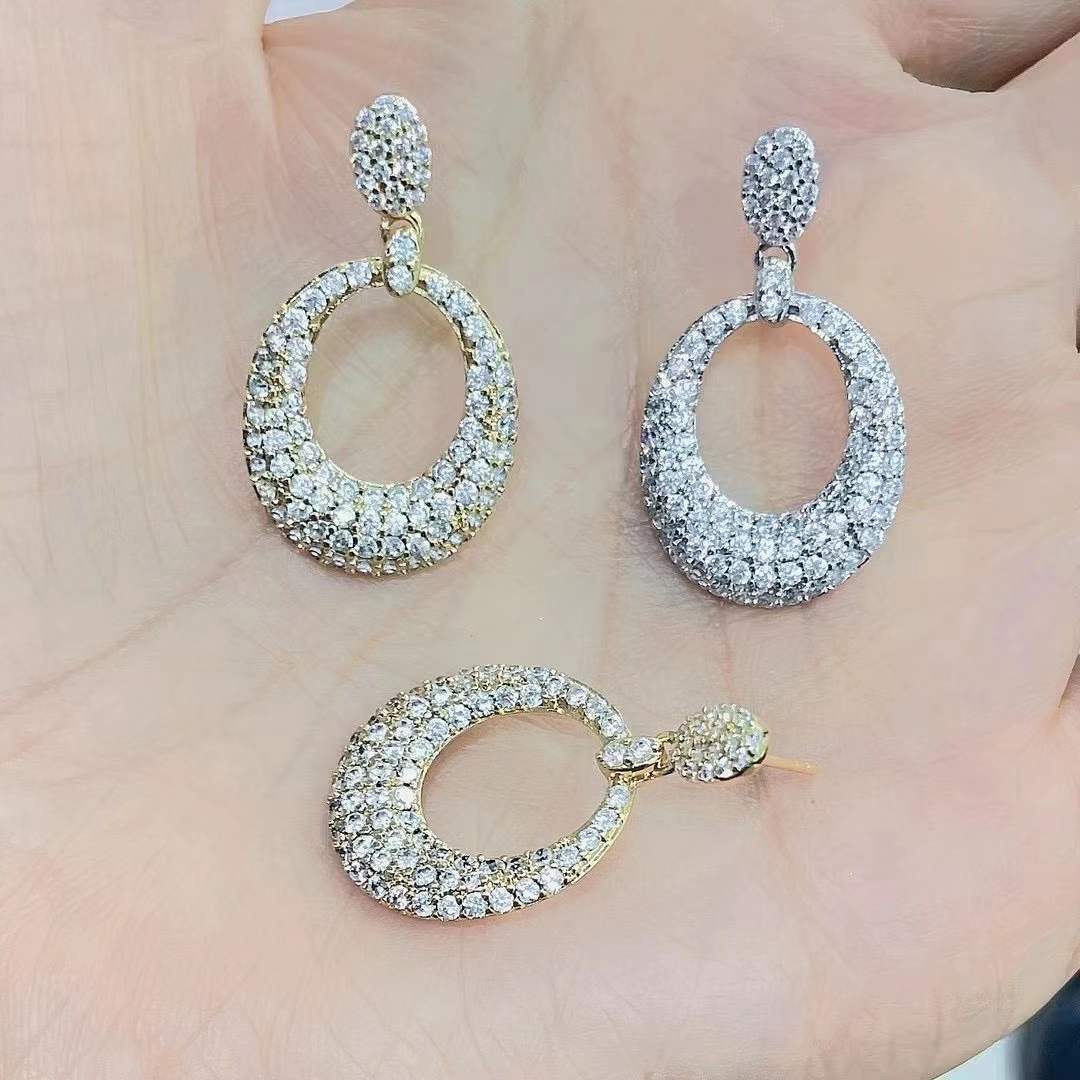 Fashion Geometric Oval Hollow Full Zircon Big Copper Earrings Wholesale display picture 2