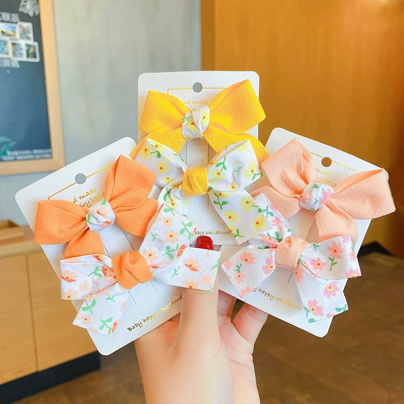 Cute children's universal hairgrip with bow, hair accessory, floral print