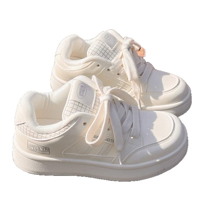 Corea del estilo universitario pareja zapatos blancos para mujeres otoño de 2025 nuevo estilo de cabeza redonda zapatos de skate casuales para mujeres