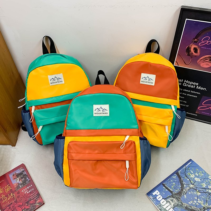Mochila coreana de gran capacidad para estudiantes de primaria, mochila de estilo ligera, mochila deportiva de ocio para niños.