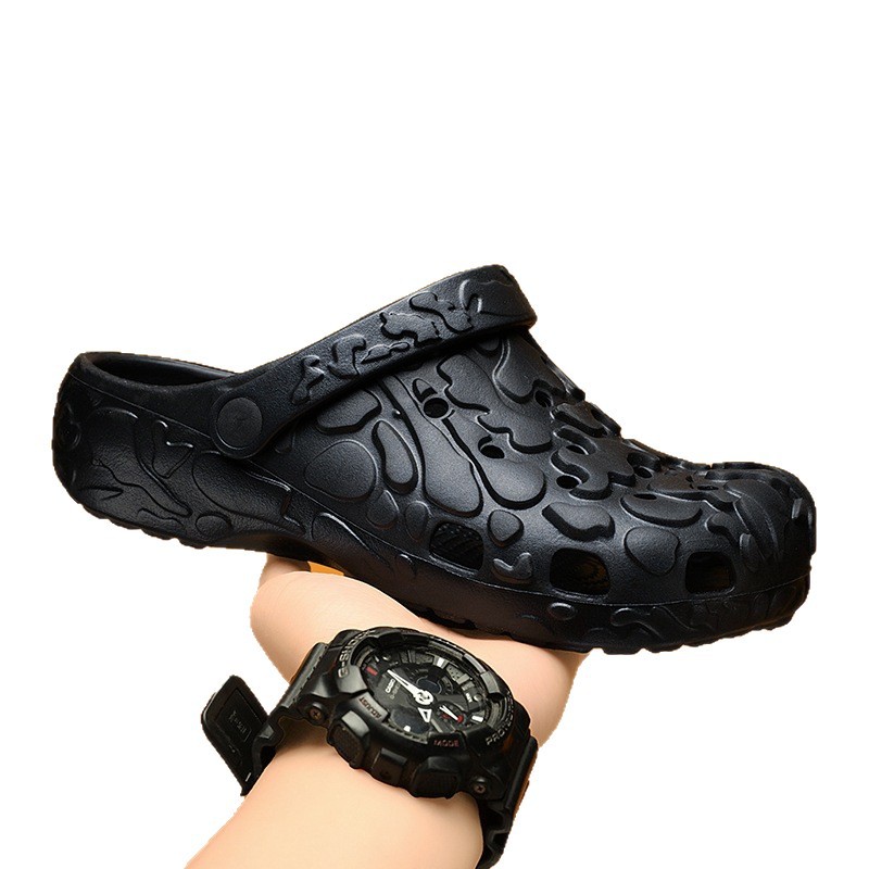 Zapatos con agujeros transfronterizos para hombres, nuevas zapatillas de primavera y verano, zapatillas perezosas con absorción de impactos de suela gruesa, sandalias Baotou a la deriva en la playa