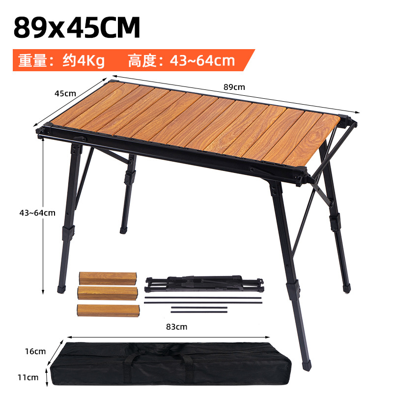 Mesa plegable al aire libre grano de madera aleación de aluminio mesa de rollo de huevo gran elevación camping mesa de comedor portátil camping auto-conducción mesa de aluminio