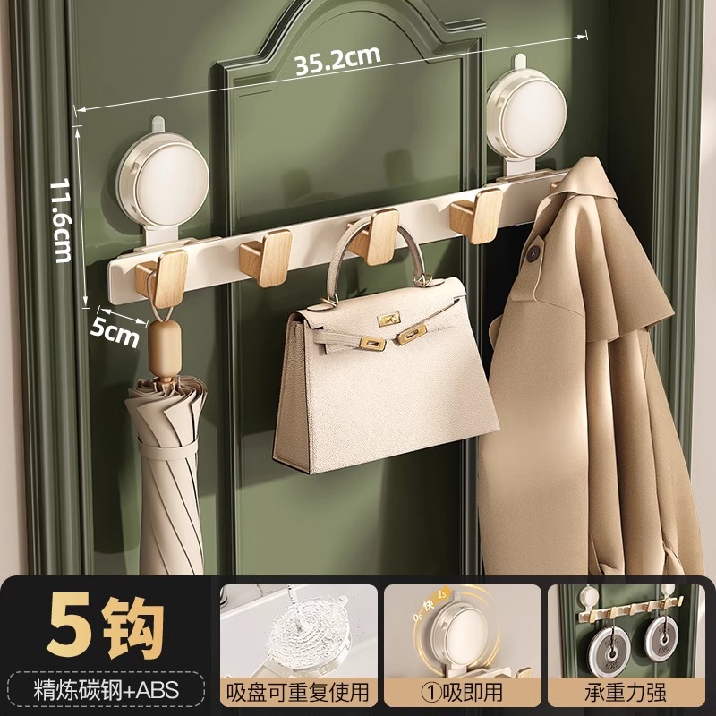 Gancho de ventosa detrás de la puerta una fila de agujeros sin perforación fuerte portante de carga en el área de percha de ropa colgada por el portal en la puerta de entrada de almacenamiento de estantes