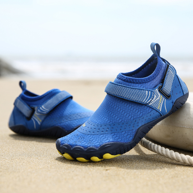 Nuevos zapatos de playa para niños al aire libre transfronterizos, zapatos de vadeo de cinco dedos, zapatos de buceo, zapatos de natación antideslizantes gruesos