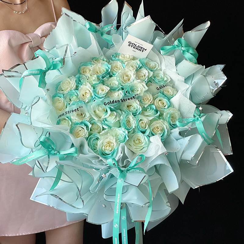 Nuevo papel de embalaje de iones de plata de color sólido película de gelatina de plata papel de borde impermeable papel florista materiales de flor