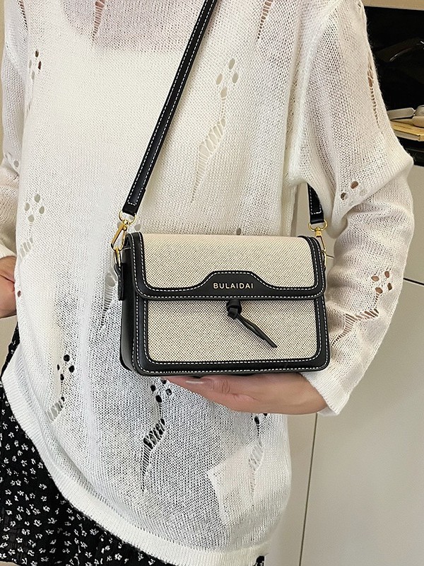 Bolsos de lujo ligero de alta calidad para mujeres 2026 comercio exterior nuevo lienzo retro empalme multi-bolsillo multicapa bolso de mochila