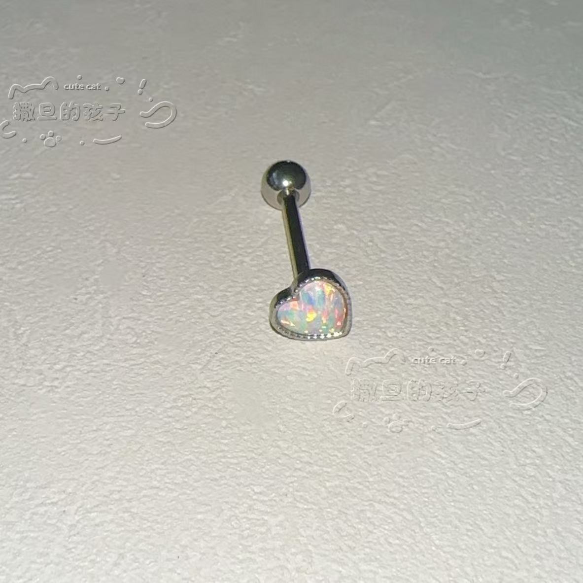 Silver pointed spike labret stud material detail