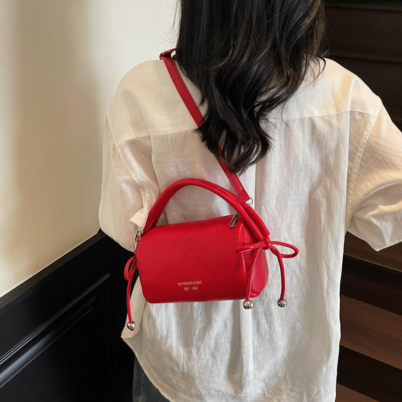 Bolso de mano simple coreano para mujeres 2025, nuevo tipo de bolso de viaje, bolso casual, ligero y de alta calidad.