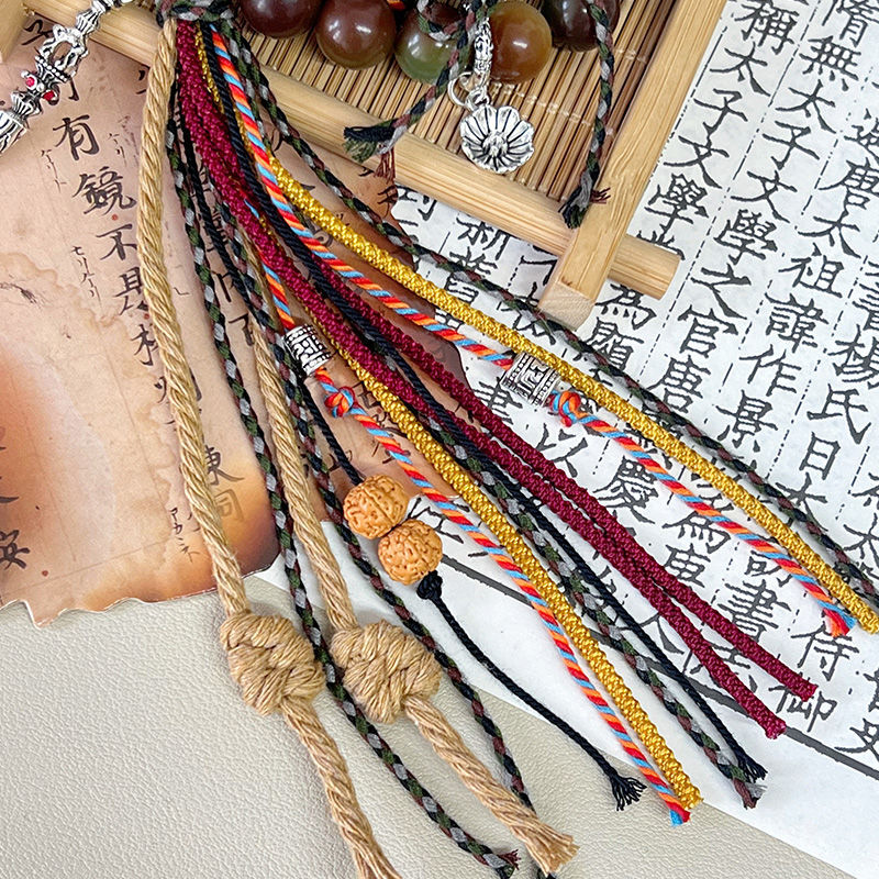 "Gesang" cordón tibetano tejido a mano de raíz de bodígan pequeño libro rojo pulsera nacional tejida productos terminados de venta caliente