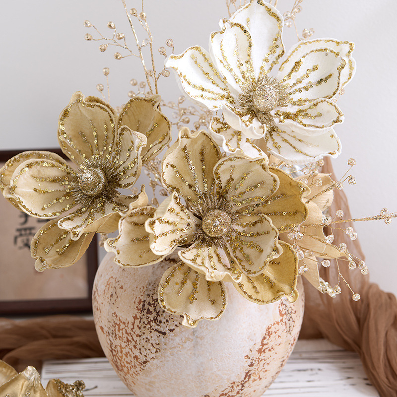 Nuevos productos transfronterizos decoraciones navideñas flores de navidad champagne oro de alta calidad simulación magnolia decoración floral para el hogar