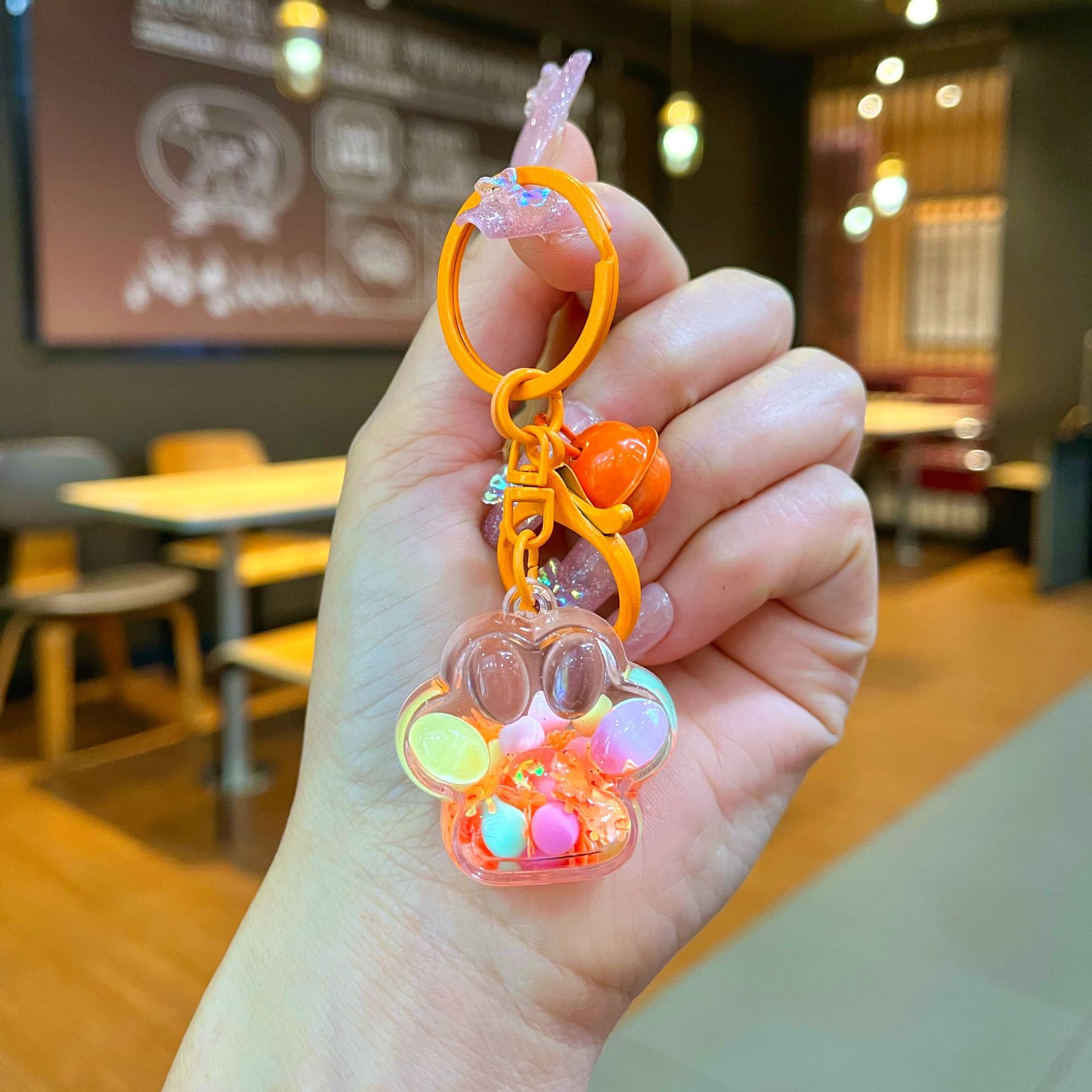 Aceite de gato garra arenas movedizas llavero lindo dibujos animados cadena colgante captura muñeca máquina agarrar pequeño regalo al por mayor