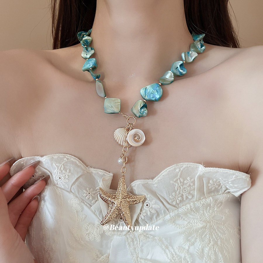 Concha Concha Concha Estrella de mar Juego de collar de perlas Estilo de vacaciones junto al mar Temperamento Cadena de clavícula Moda Collar de todo fósforo al por mayor