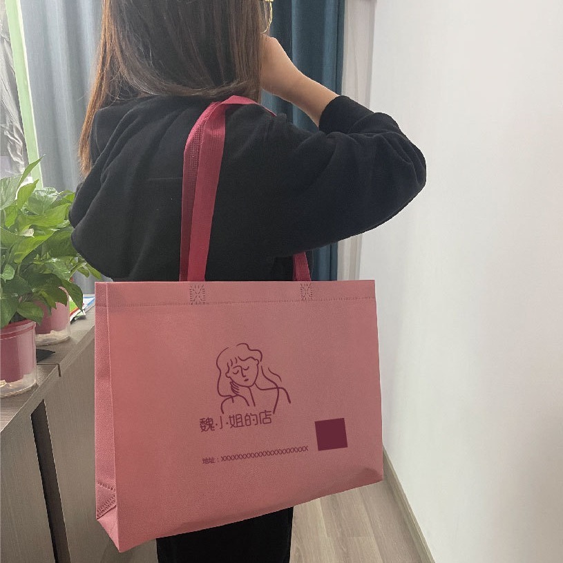 现货无纺布手提袋服装购物袋印刷LOGO车缝袋礼品包装袋培训教育袋