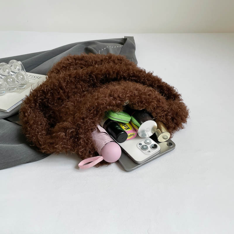 Nicho original de otoño y invierno bolsas de peluche vagabundos bolsas de hombro de chicas calientes de aire exterior rizado retro bolsas de moda