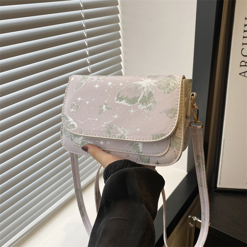 Bolso de hombro de textura bolso de mujer 2024 otoño nuevo estilo hermoso mariposa impresión de moda mochila casual bolso pequeño
