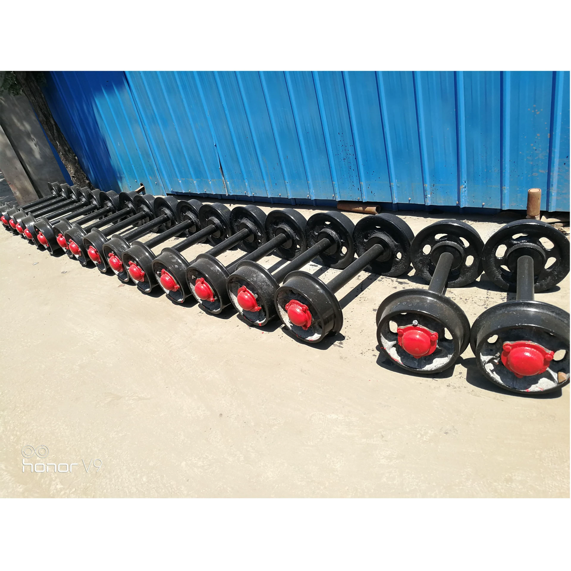 Zhongyu поставляет чугунные сплошные колёсные пары из 600 колеи из литой стали сплошные колёсные пары