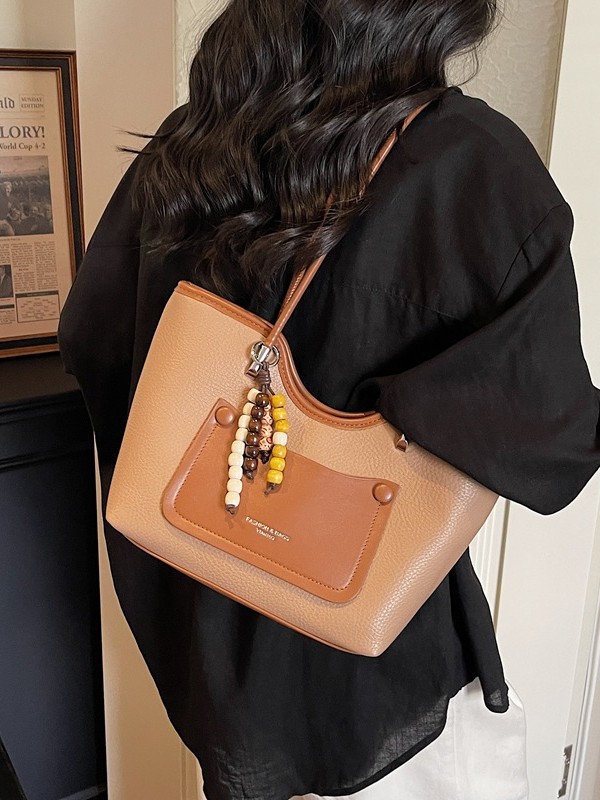 Bolsa de alta calidad retro de gran capacidad para mujeres 2026 nuevo paquete de textura ligera de lujo brazo de viaje ocio bolsa de mano image 5