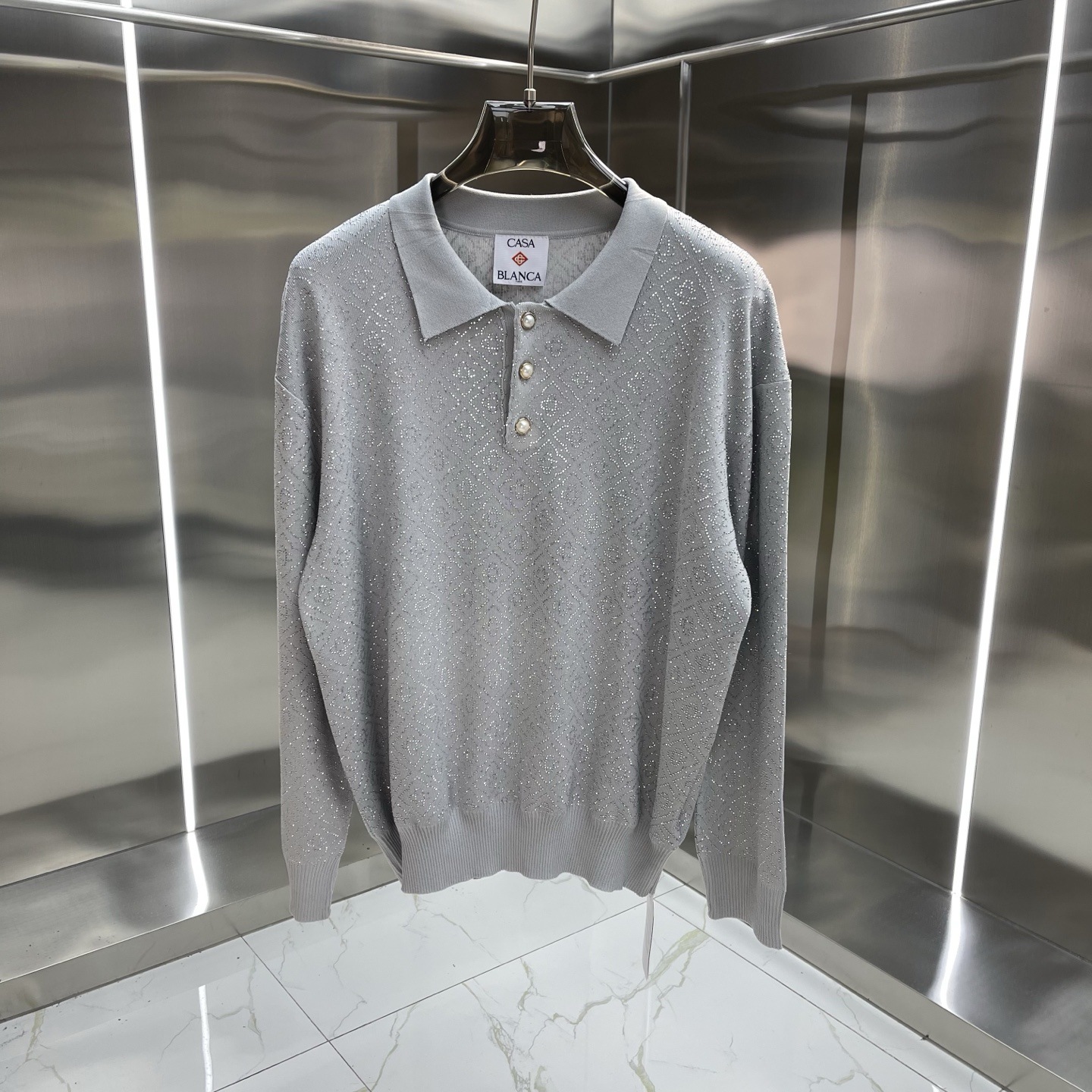 Comercio exterior casa Casablanca suéter suéter de manga corta jacquard cardigan polo pareja pantalones cortos traje