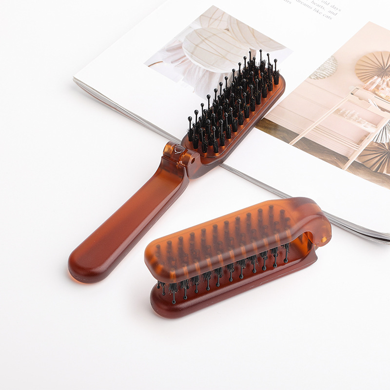Nuevo ámbar plegable melina de cerdo peine portátil para viajar damas cabello rizado peine de estilo suelto