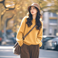 姜黄色针织独特漂亮毛衣女2025新款春季穿搭慵懒风高级感上衣