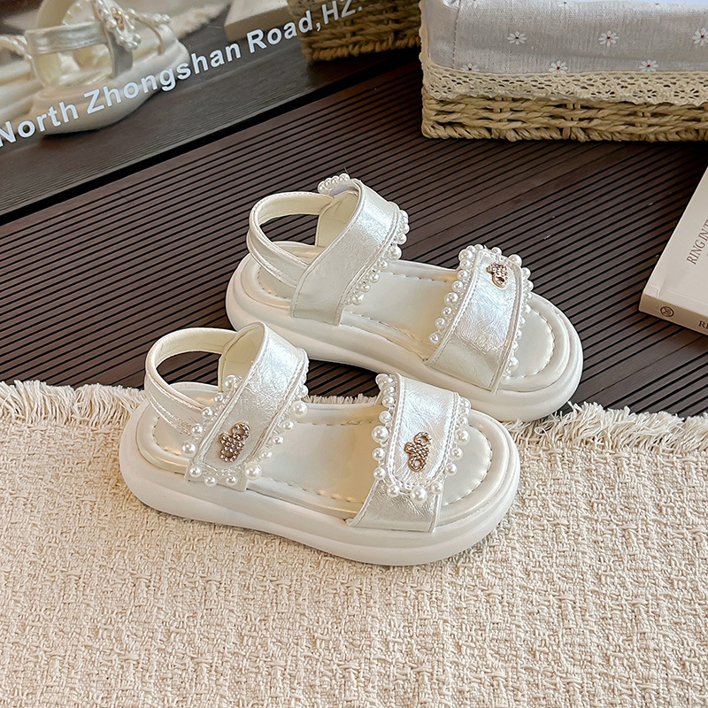 Modas para niñas sandalias versátiles de verano 2026 nuevos zapatos de playa de aire extranjero para niños grandes zapatos de princesa de perlas image 7