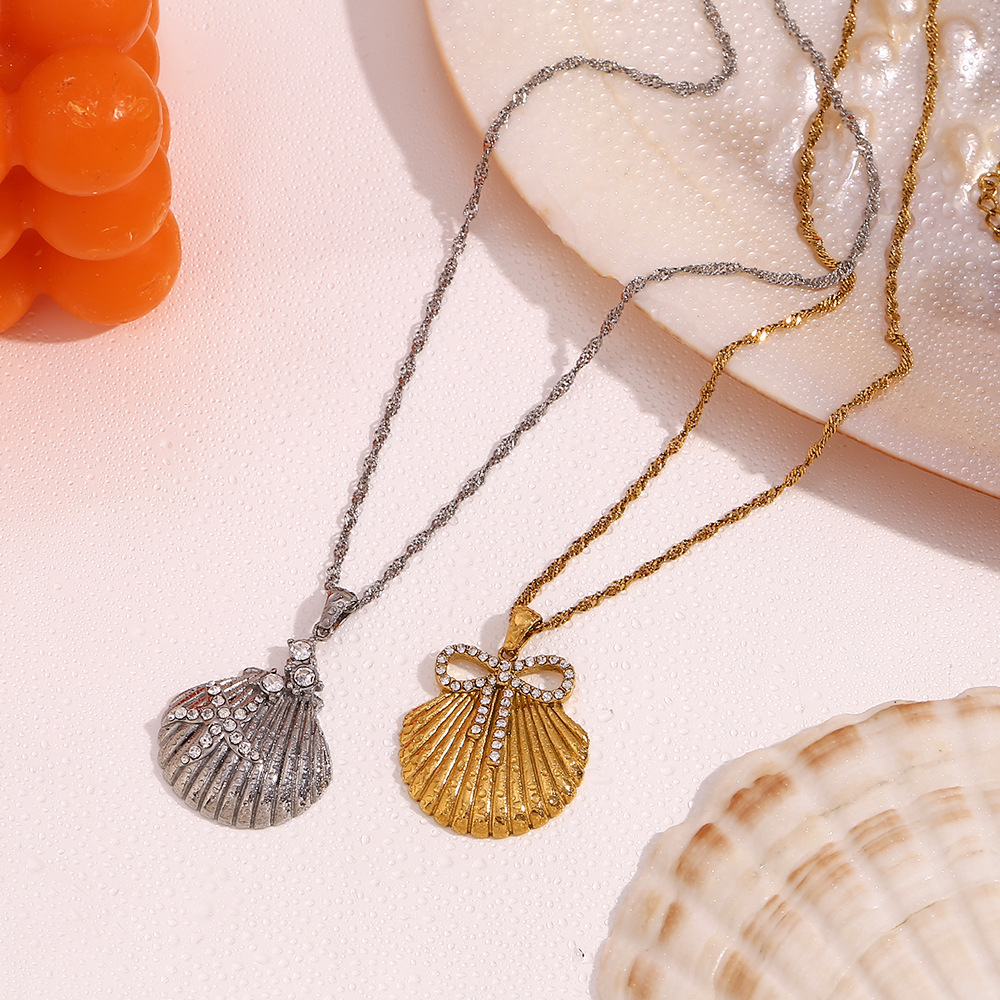 Scallop With Starfish Bow Stainless Steel Pendant Necklace