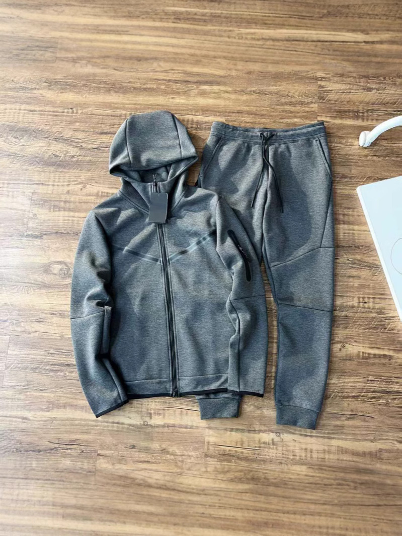 新しいメンズ春と秋のジャケットとズボンのフード付きスポーツカジュアルオールマッチスーツステッチフード付きジッパーウインドウォーカーシリーズ