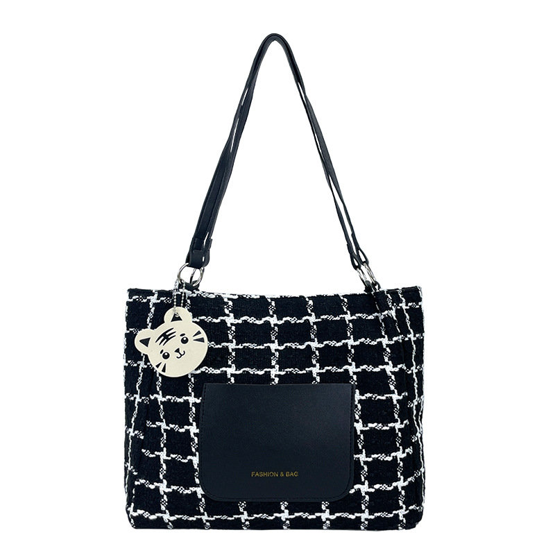 Diseño de nicho bolsos de punto para mujeres 2024 nuevos bolsos de moda de moda bolsos de hombro retro bolsos especiales de cercanías a cuadros