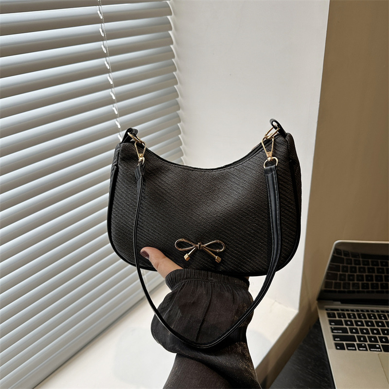 Bolsos populares de este año para mujer 2025 nuevo estilo de alta gama moda de un solo hombro bolsa de axila de diseño de nicho bolsa de bola de masa de axila