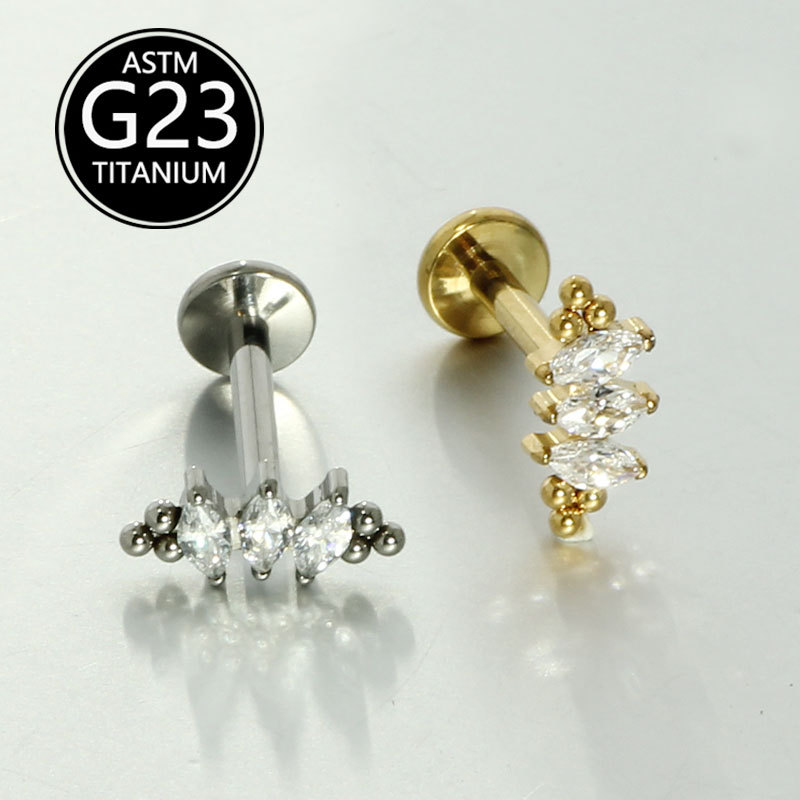 Silver pointed spike labret stud material detail