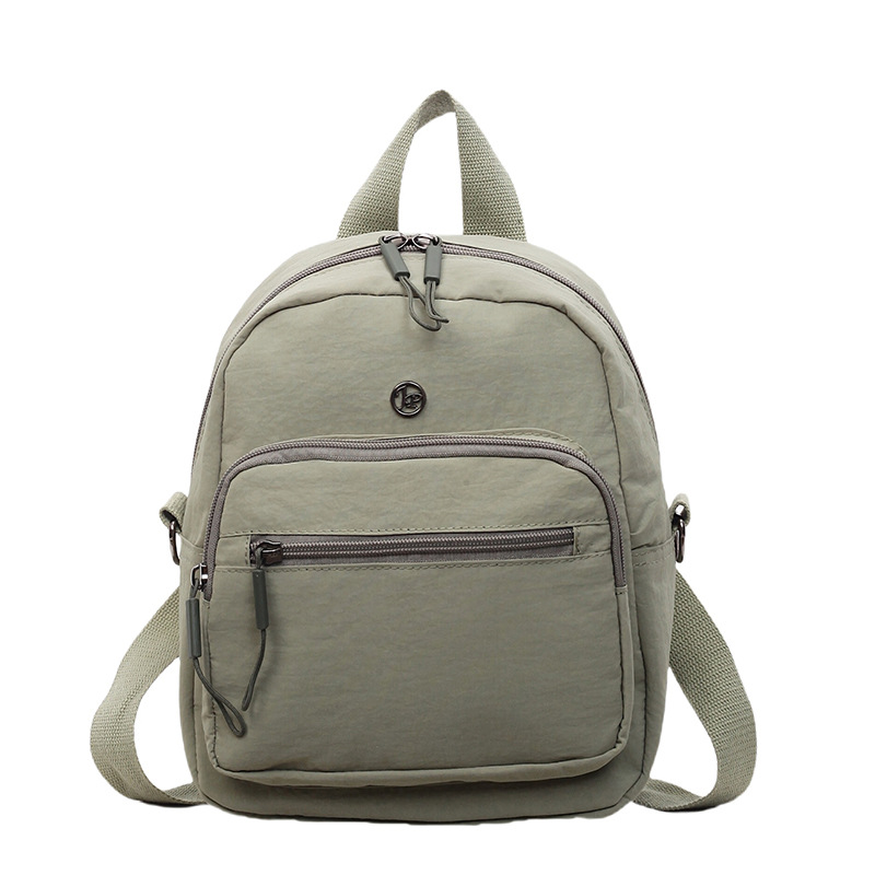 Mini mochila ligera coreana de moda casual mochila de viaje al aire libre de viaje de viaje simple mochila de estudiantes