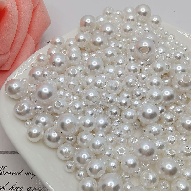 Perlas de color resaltadas perforadas perlas de plástico ABS DIY material de bolsas hechas a mano accesorios accesorios al por mayor