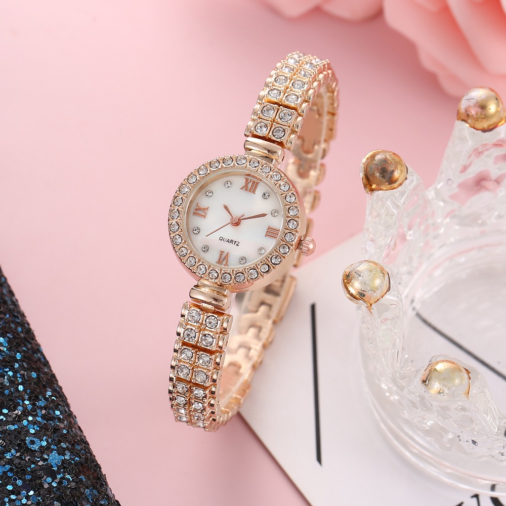 Nueva moda pequeño dial de diamante correa de acero de diamante reloj de mujer