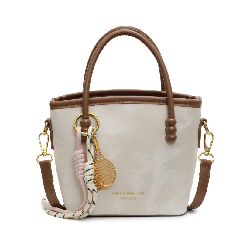 Comercio exterior venta caliente bolso de cubo de mano damas 2025 nuevo estilo de tendencia universal bolso de hombro de alta calidad bolso de moda