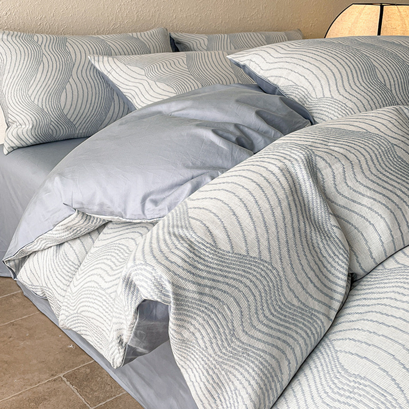 Luz de lujo algodón lavado con agua de algodón cuatro piezas de ropa de cama de alta calidad cuatro estaciones sábanas de algodón universal de tres piezas