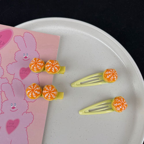 Show off a sugary mandarin orange hair clip—adorable little orange BB clips with a girly, food-inspired design, perfect as seaside accessories or cartoon-themed headwear!