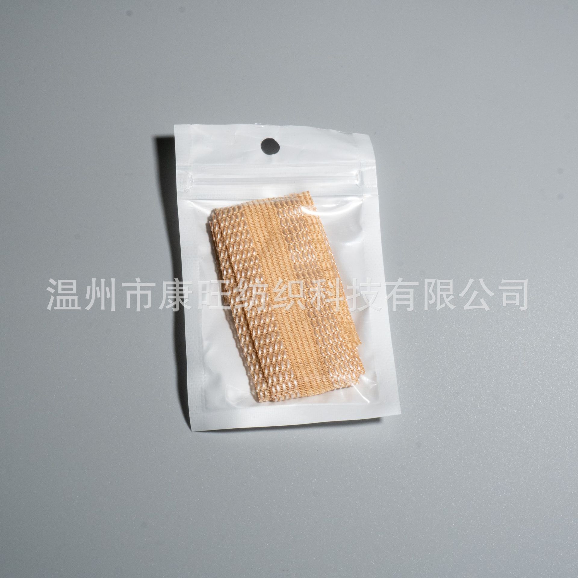 Los pantalones de la fábrica de Wenzhou se pegan en la boca del pantalón se acortan