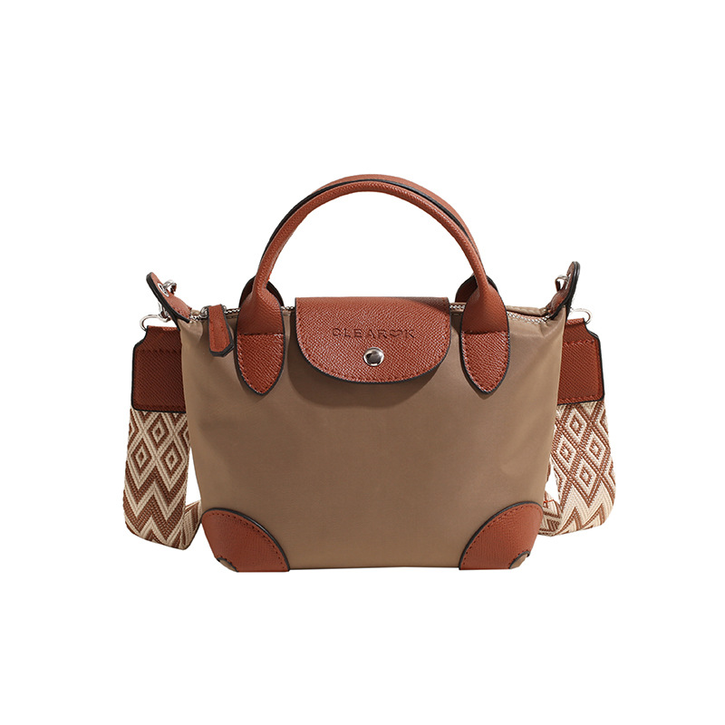 Mini bolso de bolsillo de mano pequeña mujer 2025 nuevo estilo transfronterizo de tela de nylon ligera de moda ocio de hombro bolsa inclinada